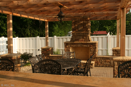 outdoor fireplace with alfresco dining