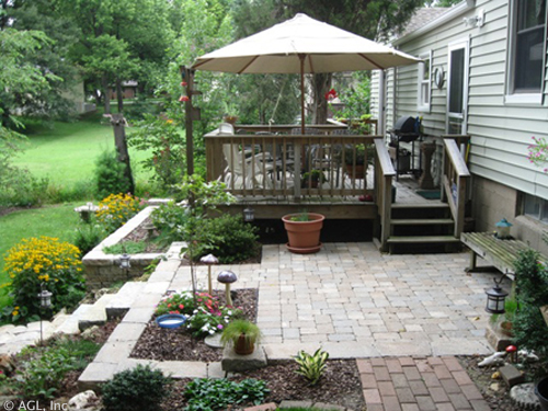 patio with stone steps and deck