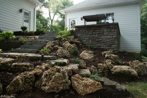 outcropping steps with cultured stonewall