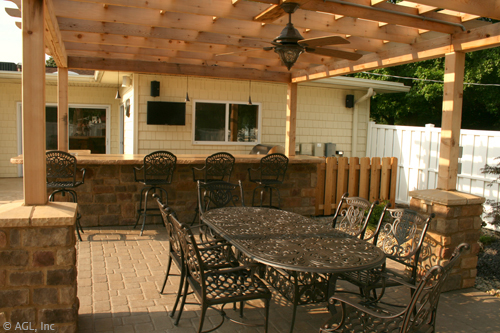 pergola dining area with ceiling fan